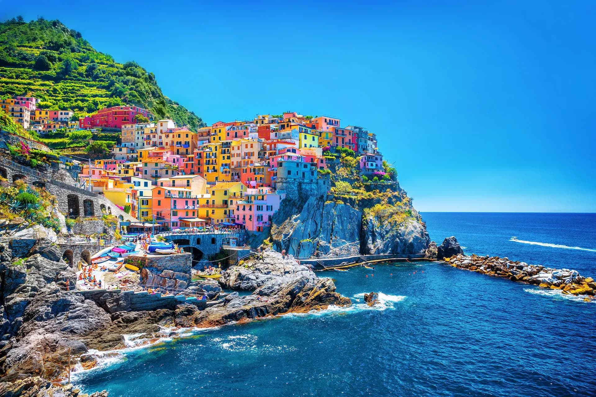 Colorful cliffside village overlooking the deep blue Mediterranean Sea in Cinque Terre.