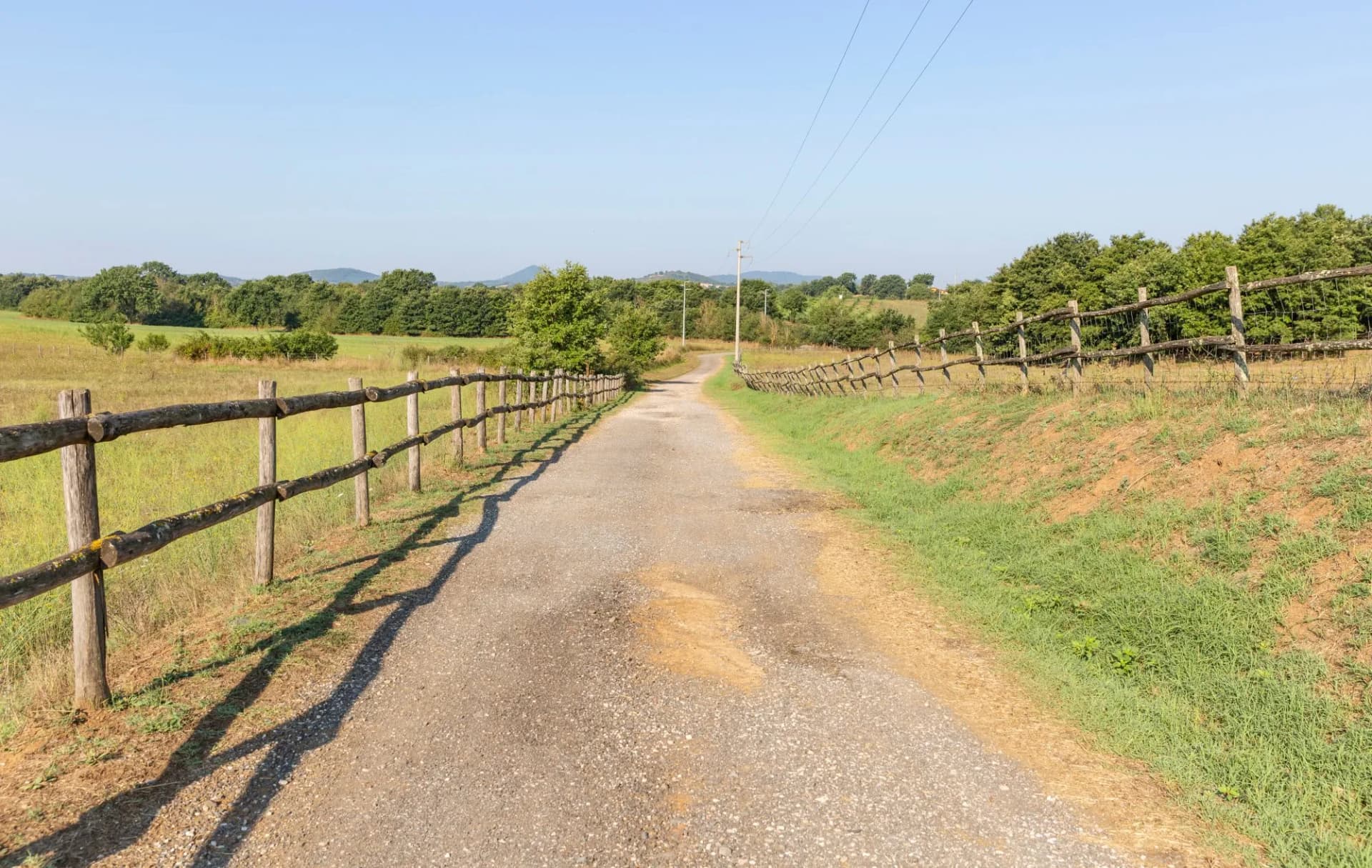 a gravel road on a farmland next to Monterosi, province of Viterbo, Lazio, Italy