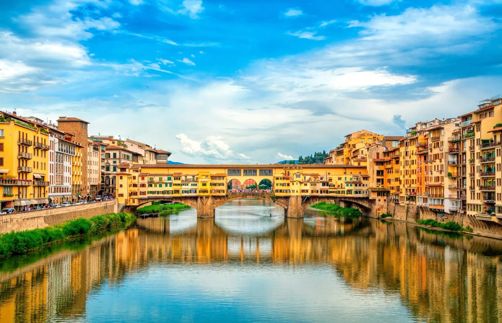 View of medieval stone bridge Ponte Vecchio over Arno river in Florence, Tuscany, Italy. Florence cityscape. Florence architecture and landmark.