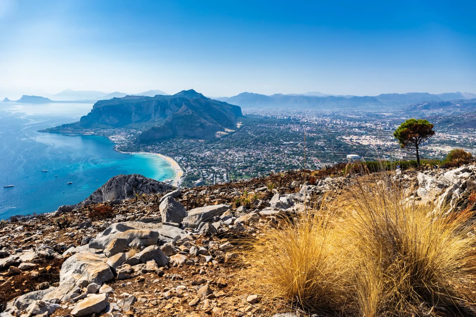 The panoramic view over Mondello bay and Monte Pellegrino from the top of Mountain Gallo in Sicily, Italy
